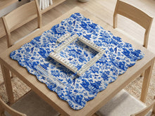 Blue mahjong mat with a porcelain-style floral and scenic pattern.