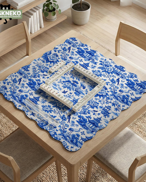 Blue mahjong mat with a porcelain-style floral and scenic pattern.