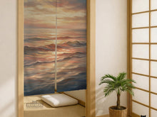 A Japanese-style split door curtain with an abstract ocean sunset design in peach, blush, cream, and muted blue.