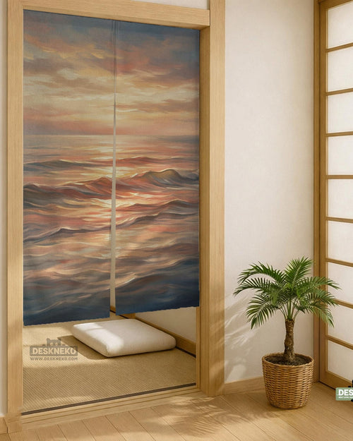 A Japanese-style split door curtain with an abstract ocean sunset design in peach, blush, cream, and muted blue.