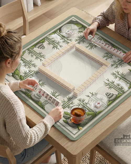 Square mahjong table mat with a bamboo garden design, green bamboo, stacked stones, and flowing sand lines on a cream background.