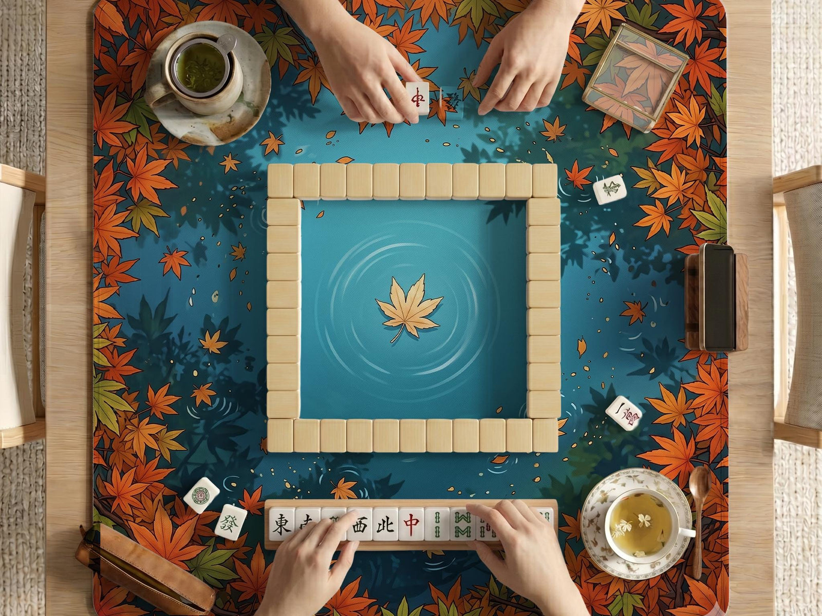 Square mahjong table mat with an autumn pond design, orange maple leaves around the border, and blue water with leaf and ripple details.