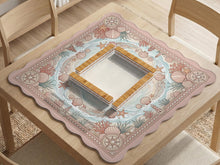Blush pink mahjong table mat with seashells, coral branches, starfish, and soft seafoam wave details around the border.