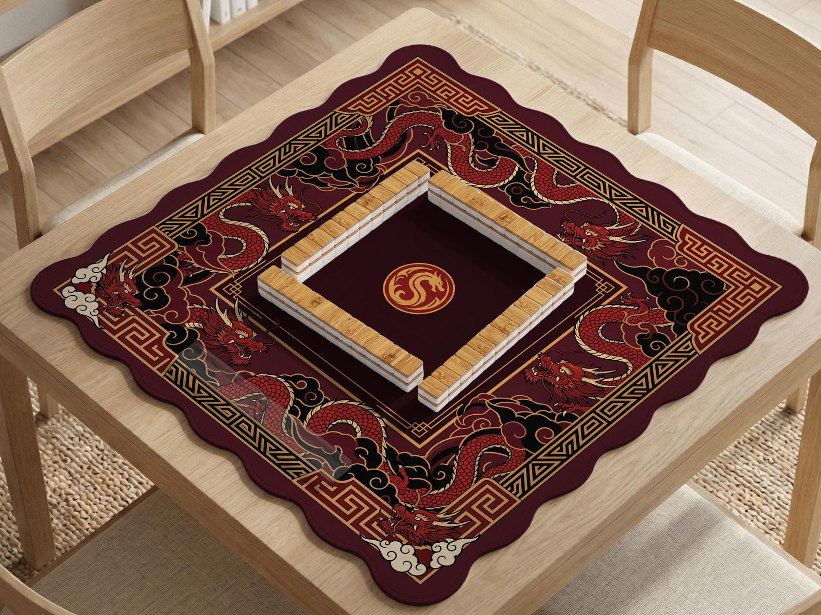 A square mahjong table mat with a red, black, and gold dragon design and an open center area.