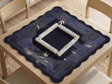 Navy blue mahjong mat with bamboo line art border, art deco framing, and a dark open center.