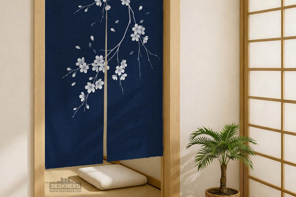 Navy door curtain with pink cherry blossom branches and a light floral layout on a dark background.