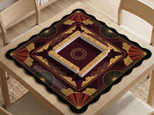 Square mahjong mat with red, black, and gold dragon silhouettes, cloud motifs, and decorative fan-like shapes.