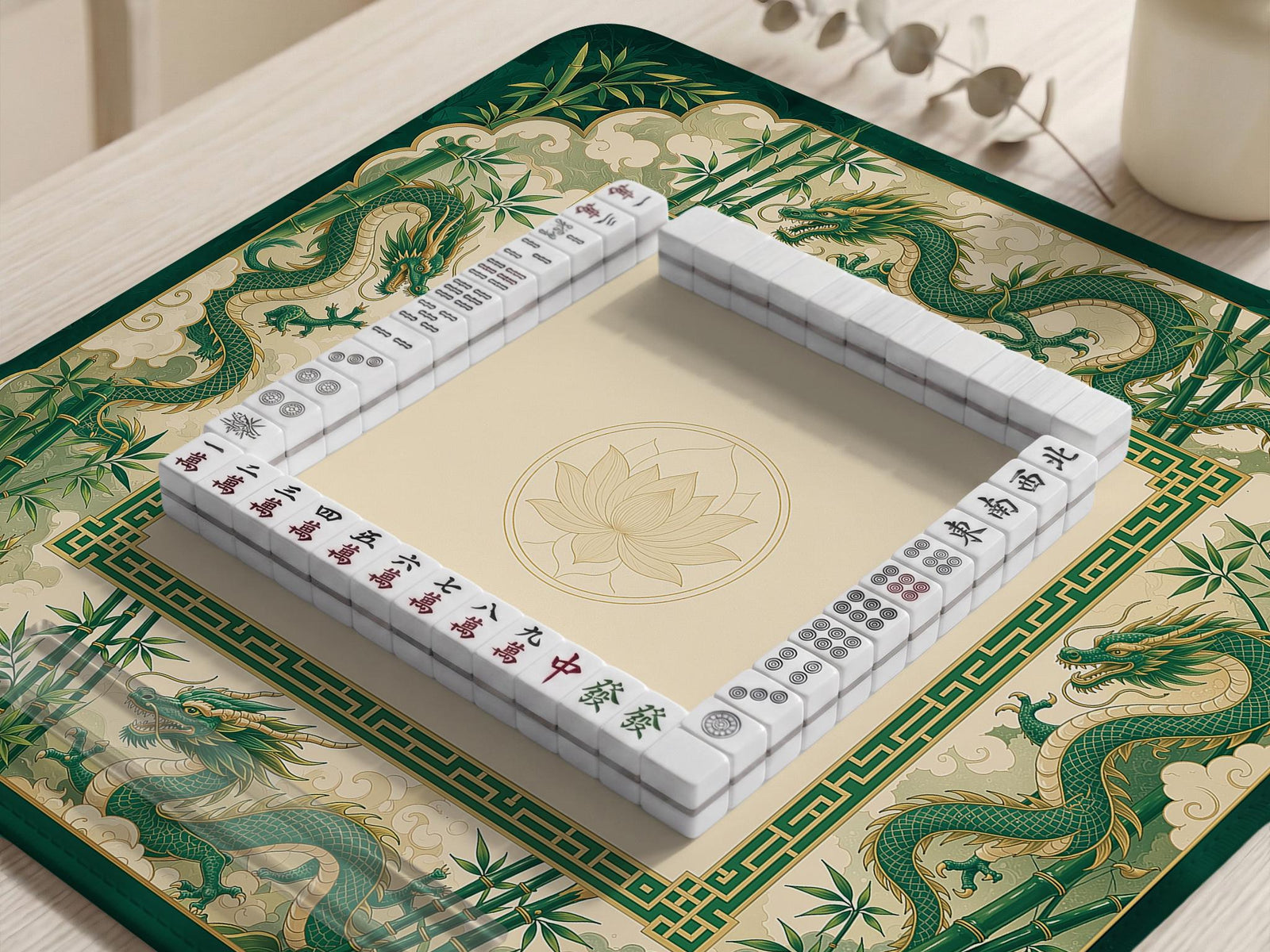Green mahjong mat with dragon and bamboo artwork and a clean open center.