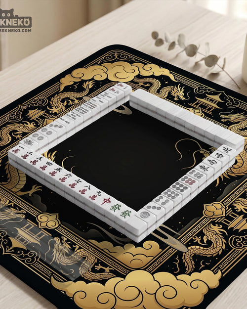 Black and gold mahjong mat with a dragon border, ornate cloud details, and a dark center area.