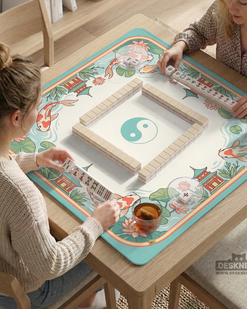 Pastel mahjong mat with a koi fish and lotus pond design, pagoda details, lily pads, and curved water lines.