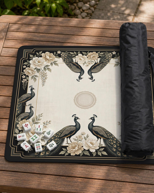 Cream mahjong table mat with a chinoiserie floral border, dark peacocks, soft gold linework, and an open center area.