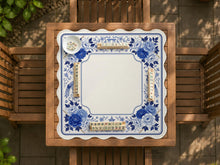 Square mahjong table mat with a blue and white floral design, bird artwork, peonies, vines, and a framed play area.