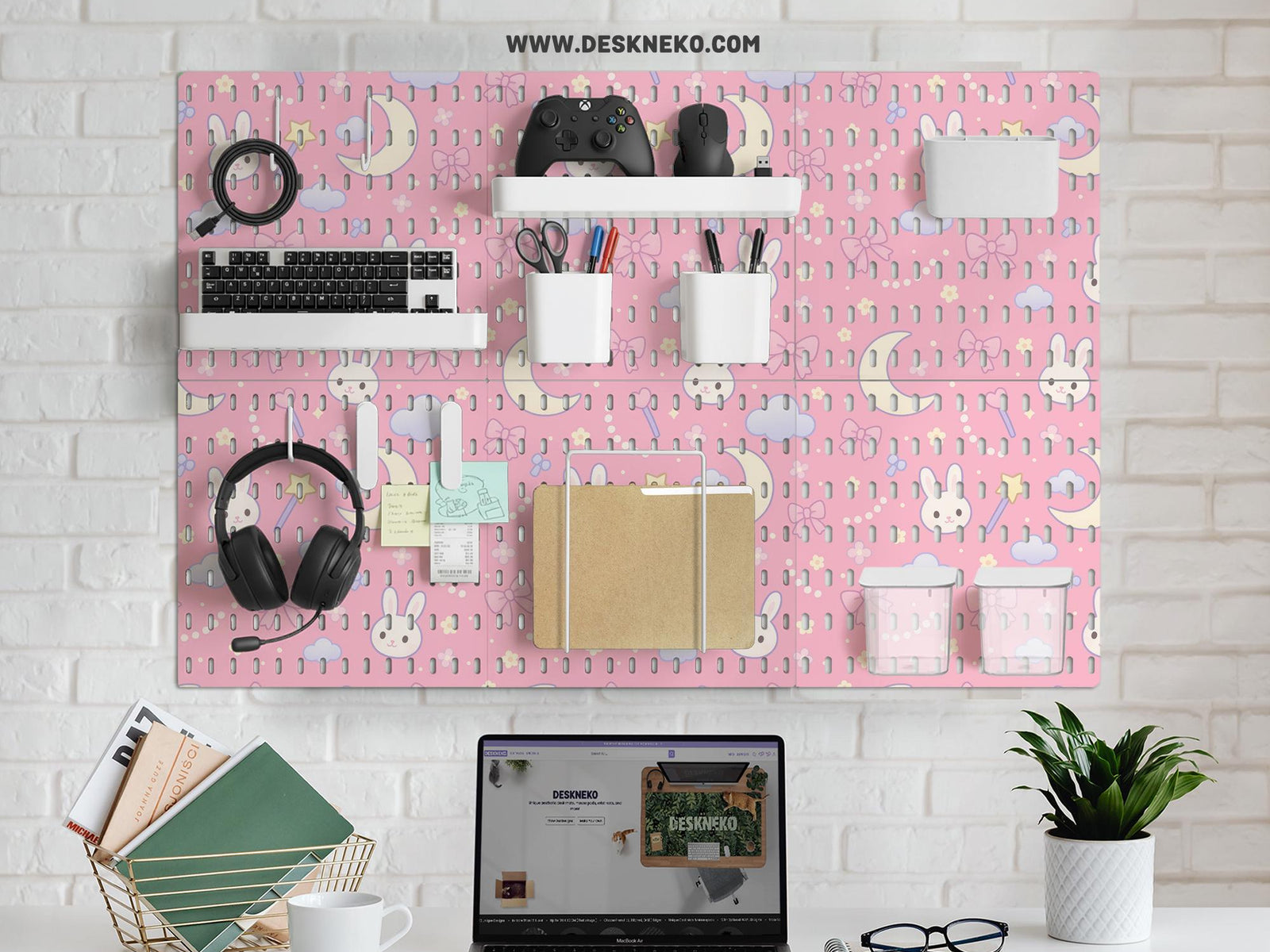Pink pegboard panels with a kawaii bunny, cloud, moon, bow, and star pattern shown as a wall organizer set.
