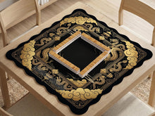 Black and gold mahjong table mat with a scalloped edge, dragon artwork around the border, cloud details, and a clean center area.