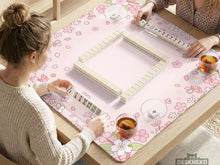 Pink square mahjong mat with a sakura flower border and a lighter center area.