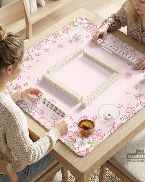Pink square mahjong mat with a sakura flower border and a lighter center area.