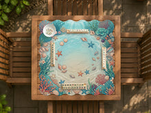 A round mahjong mat with a scalloped border, coral-colored seashells, starfish, and aqua ocean water details around an open center.