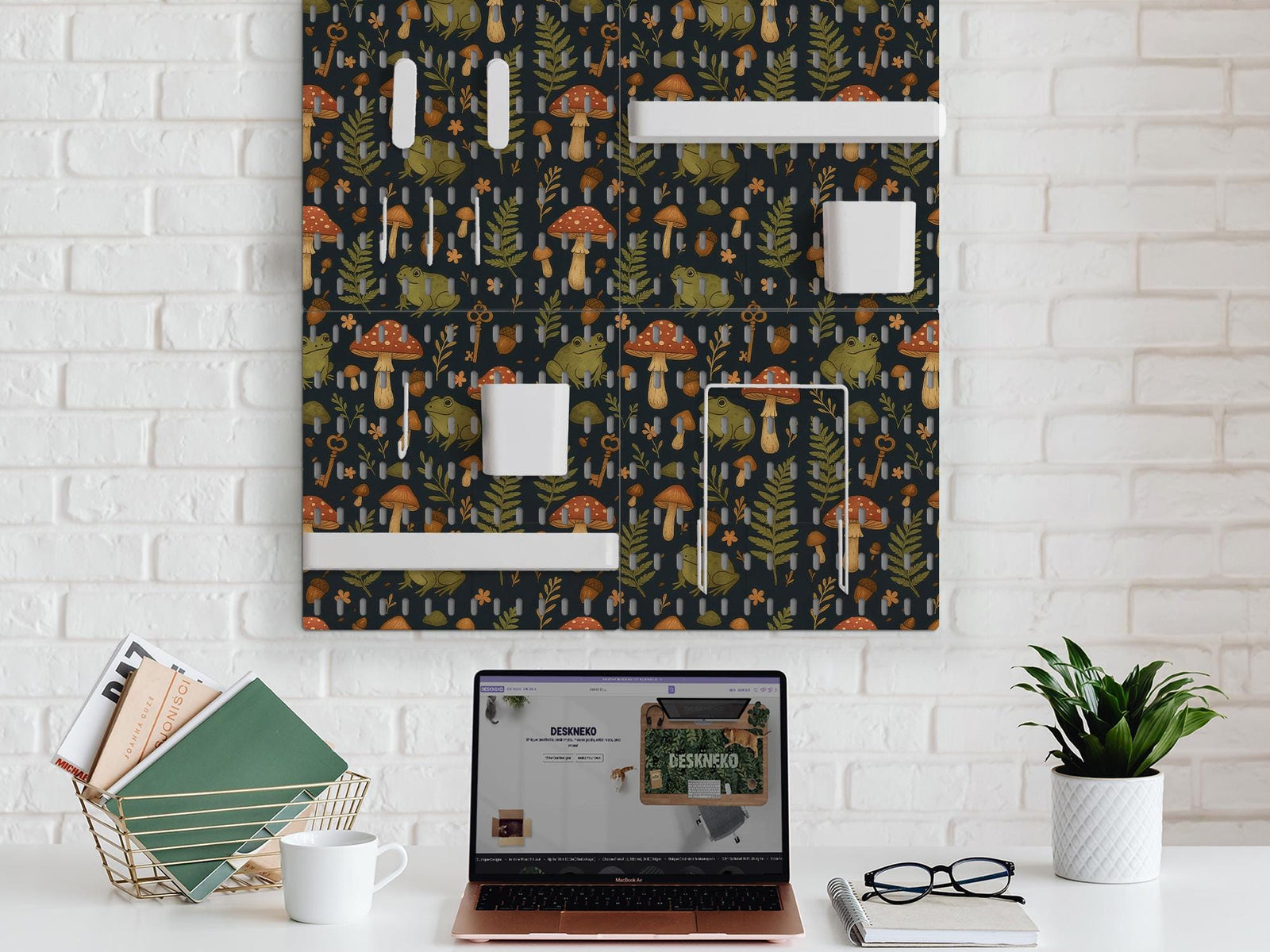 Four charcoal pegboard panels with mushrooms, frogs, leaves, and acorns, arranged as a wall organizer with hooks, shelves, containers, clips, and holders.