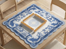 Navy blue square mahjong table mat with lotus flowers and koi fish in a porcelain-style border and a plain center.