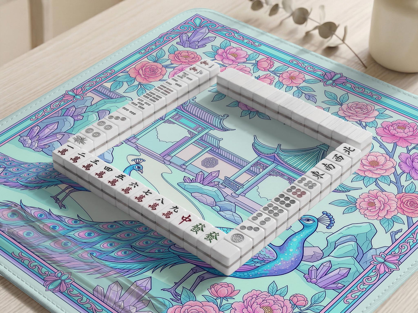 Pastel aqua mahjong table mat with peacock birds, pink flowers, pavilion details, and ornate floral linework.