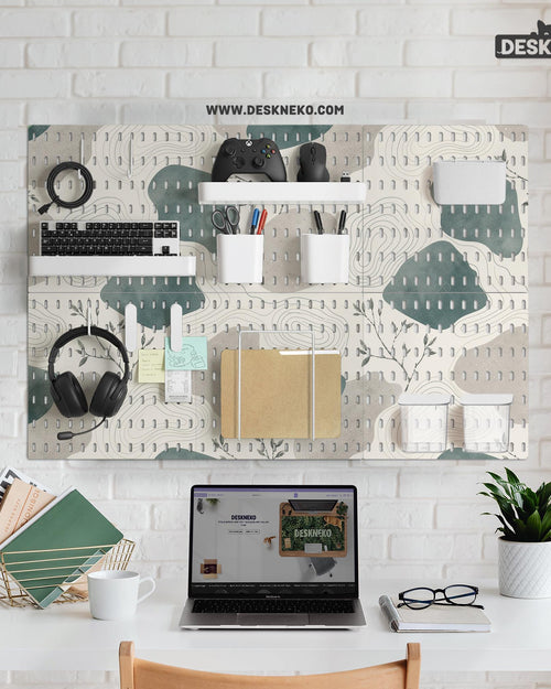Four square pegboard panels in muted sage green, warm cream, and grey with contour lines and small botanical branch details.