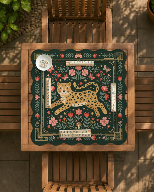 Green mahjong mat with a leopard in the center, floral folk art details, butterflies, leafy accents, and a decorative border.