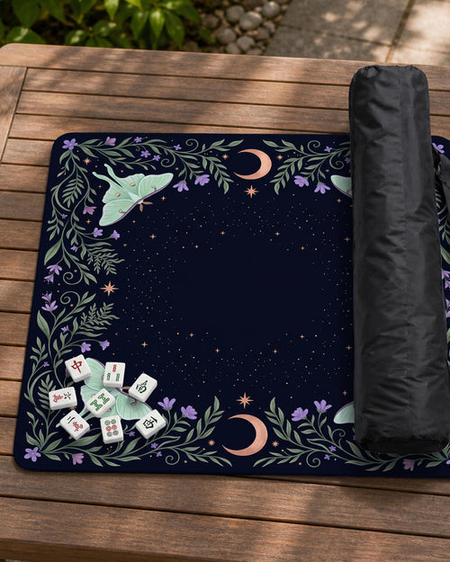 Navy square mahjong mat with a floral border, copper moons, scattered stars, pale moths, and leafy botanical details.