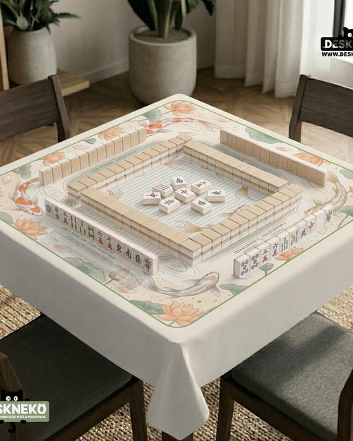 Cream mahjong mat with koi fish, lotus flowers, sage green framing, blush accents, and a striped center with printed rules.