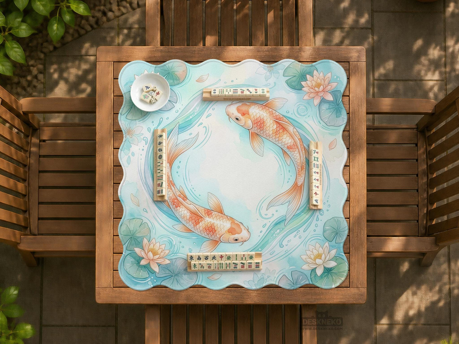 Turquoise square mahjong mat with orange koi fish, cream lotus flowers, lily pads, and soft blue water lines.
