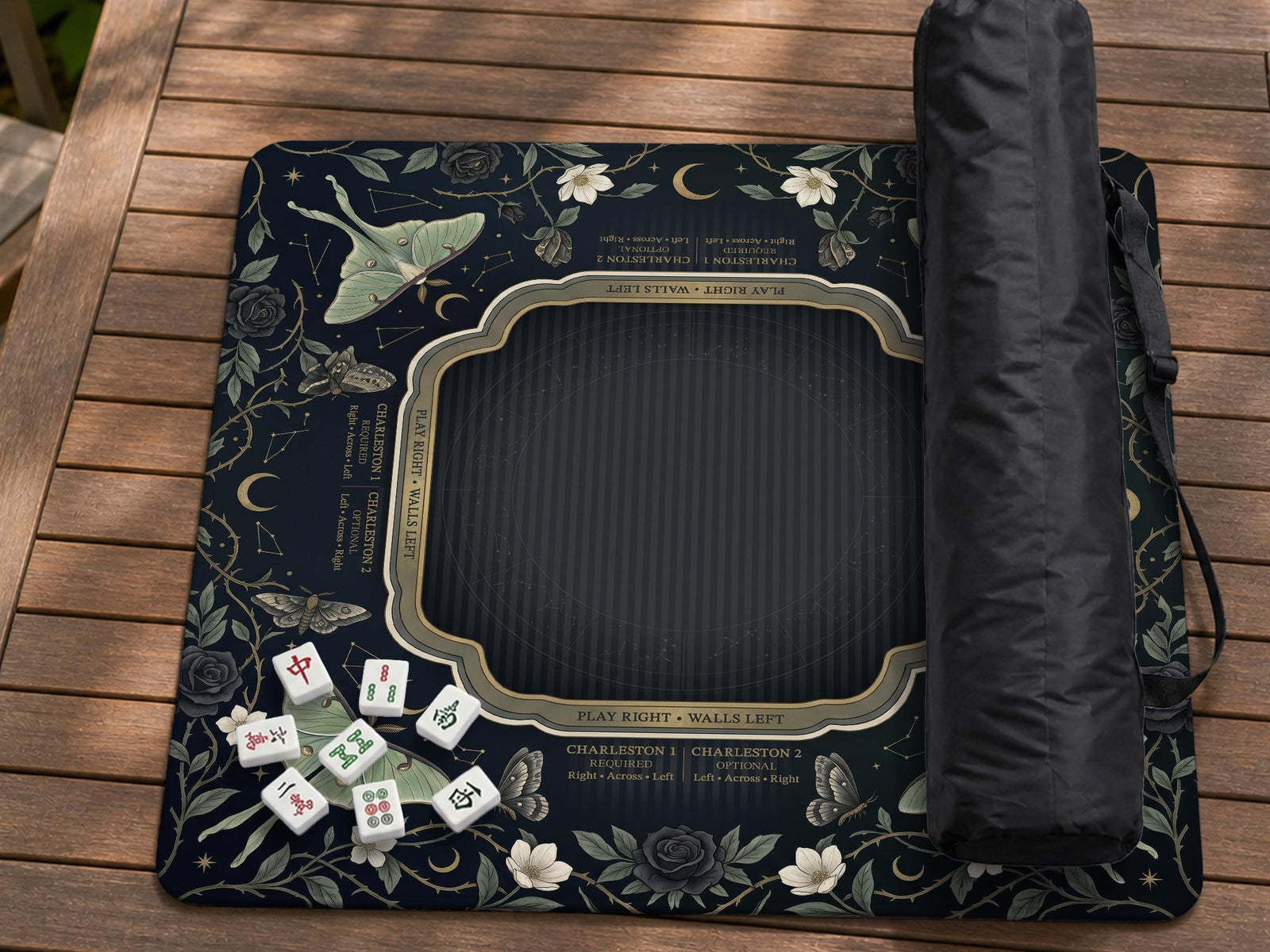 Dark floral mahjong mat with luna moth, moon phases, roses, vines, and small star details.