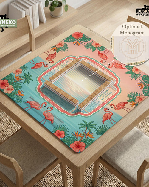 Pink mahjong mat with flamingos, hibiscus flowers, palm leaves, and an aqua lagoon background.