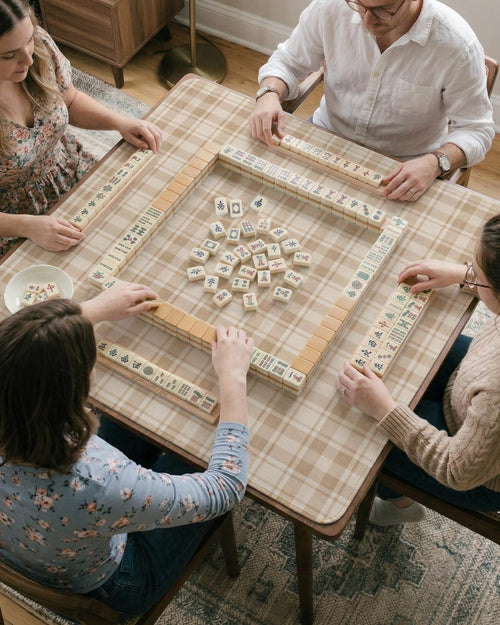 Beige plaid square mahjong mat with a cream tartan pattern.