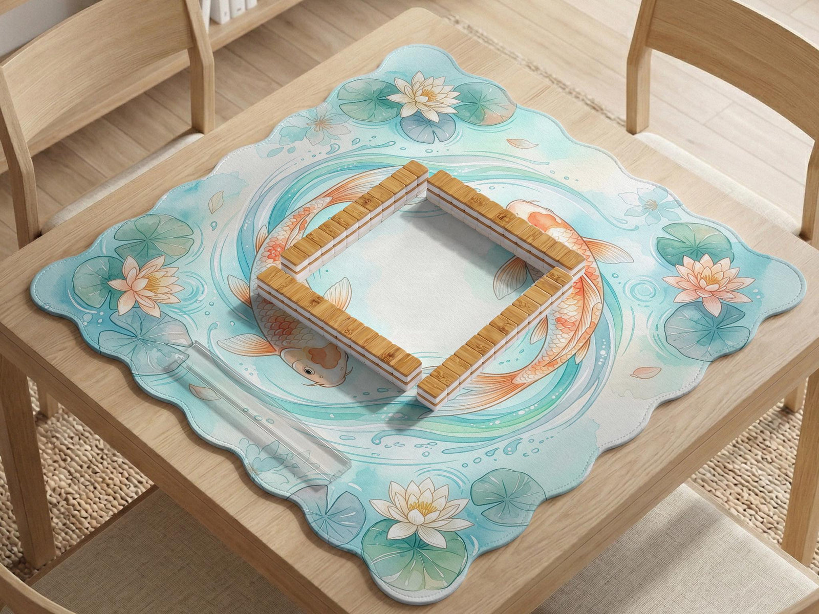 Aqua square mahjong mat with orange koi fish, water lily flowers, lily pads, and flowing pond line artwork, shown with a scalloped edge.
