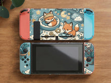 Blue Switch carrying case with cute fox characters, moon and star details, and small potted plants with beige accents.