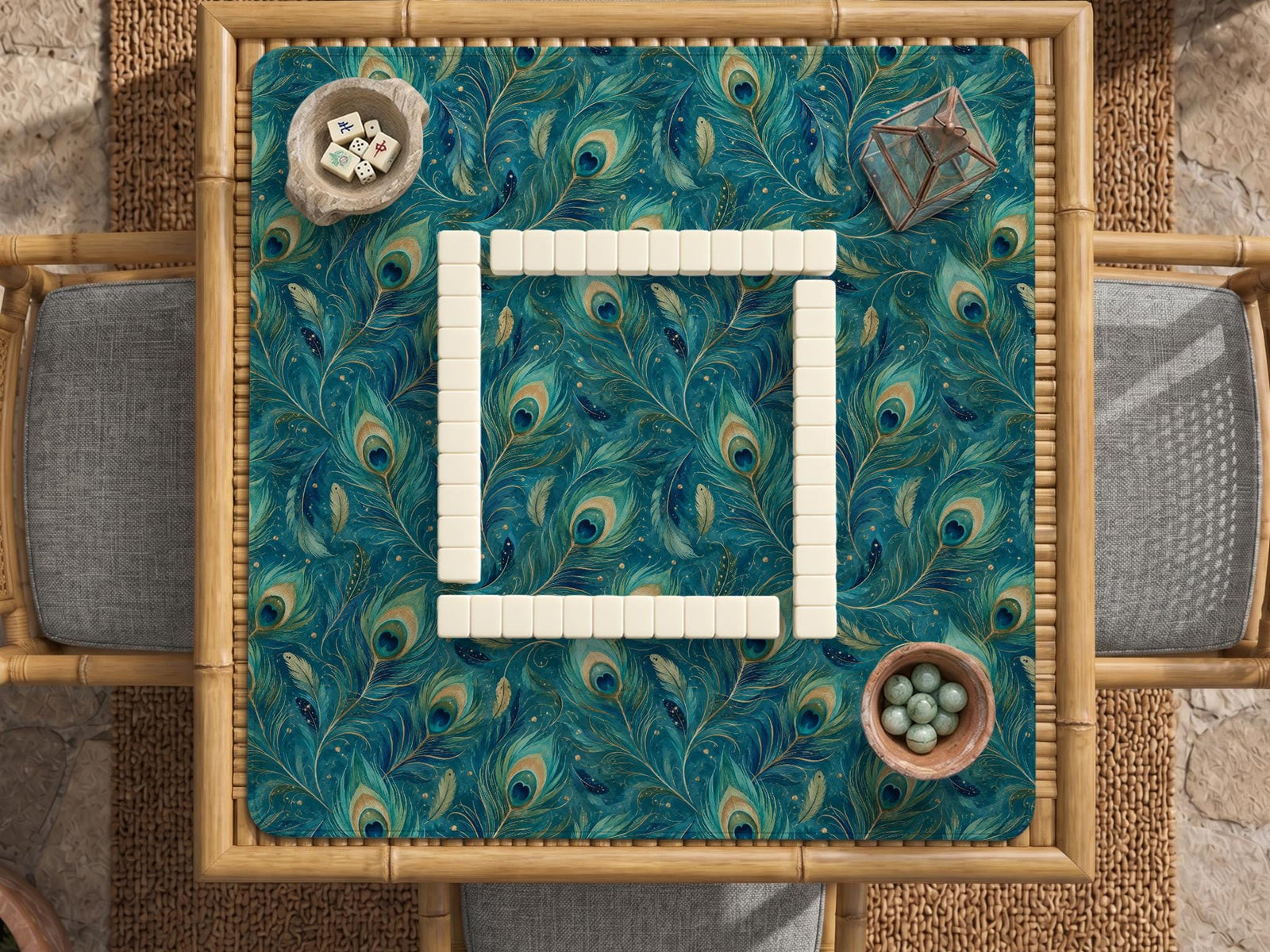 Teal mahjong mat with a peacock feather pattern in blue green tones.