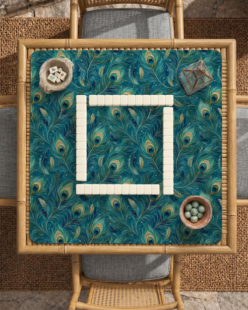 Teal mahjong mat with a peacock feather pattern in blue green tones.