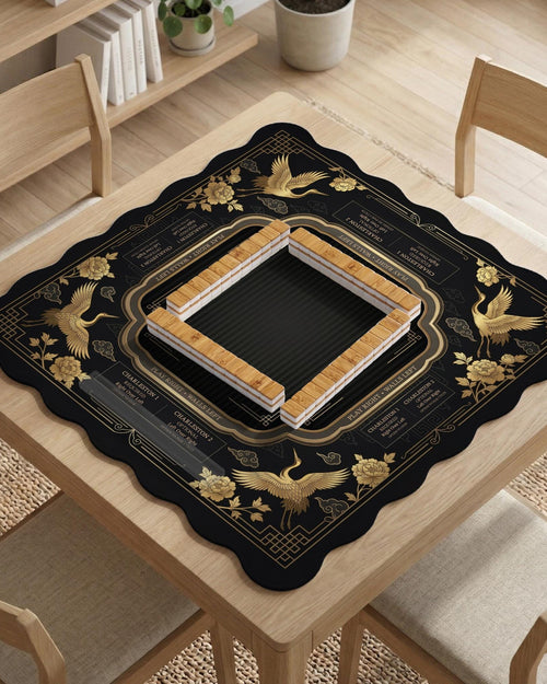 Square black and gold mahjong table mat with a crane, floral border, and printed American Mahjong rules around the edges.