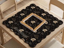 Black scalloped mahjong mat with a moth and moonflower pattern, stars, and a decorative gothic-style design.