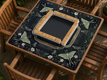 Dark floral mahjong mat with luna moths, moons, and star details in a celestial design.