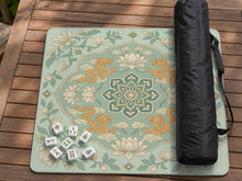 Sage green square mahjong mat with lotus flowers, golden dragons, and an ornamental center design.