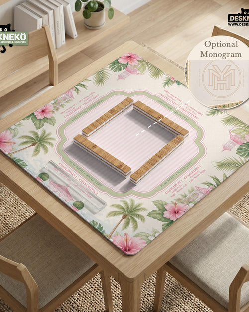 Pink mahjong mat with hibiscus flowers, palm leaves, a sage border, and a striped center area.
