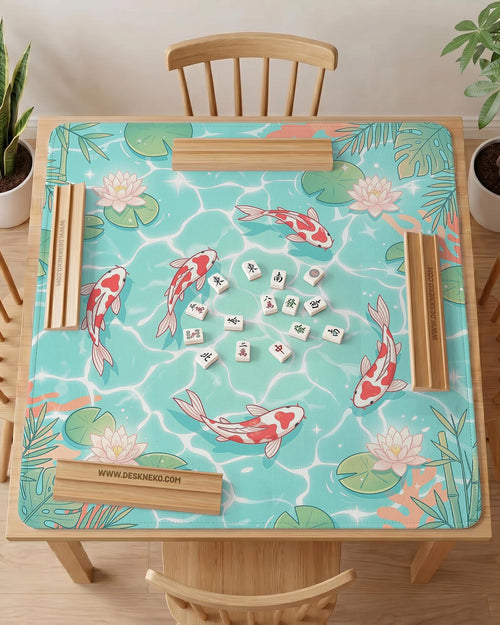 Turquoise square mahjong mat with koi fish, floating lily pads, pale lotus flowers, and green pond plants.
