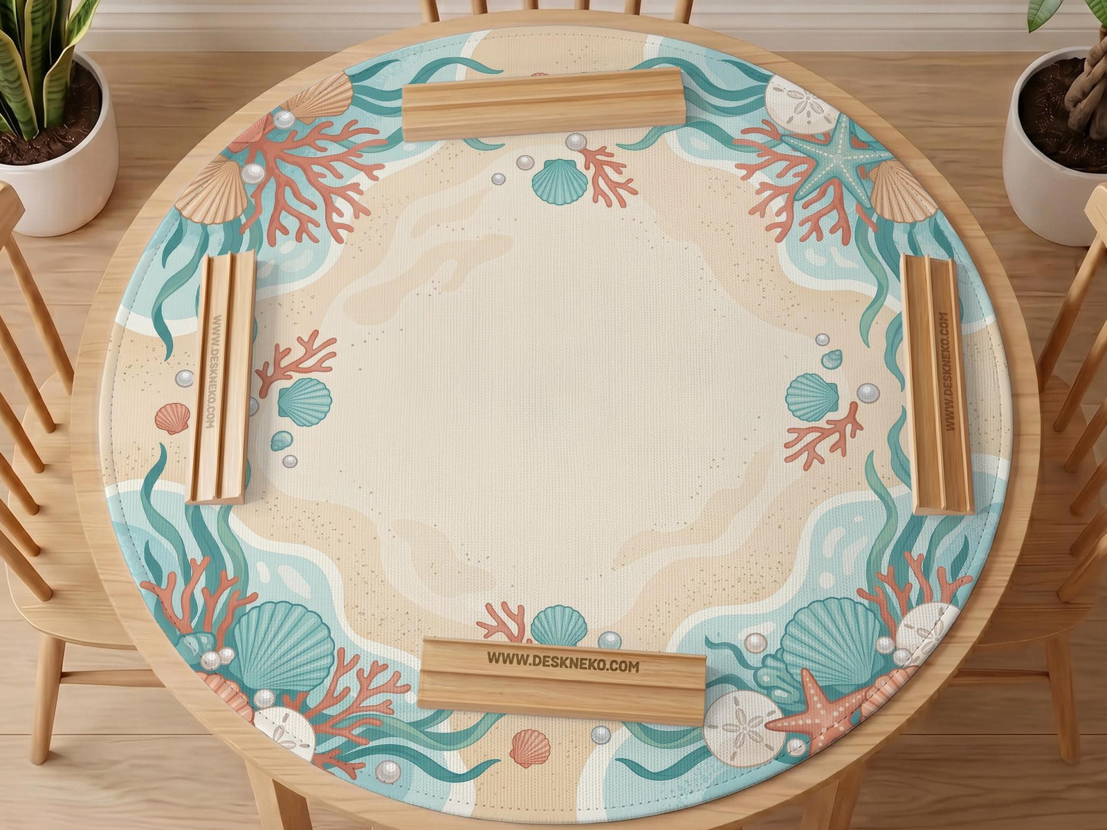 Aqua mahjong mat with seashell and coral artwork, pearl details, and a soft beach color palette in turquoise, cream, and sandy tones.