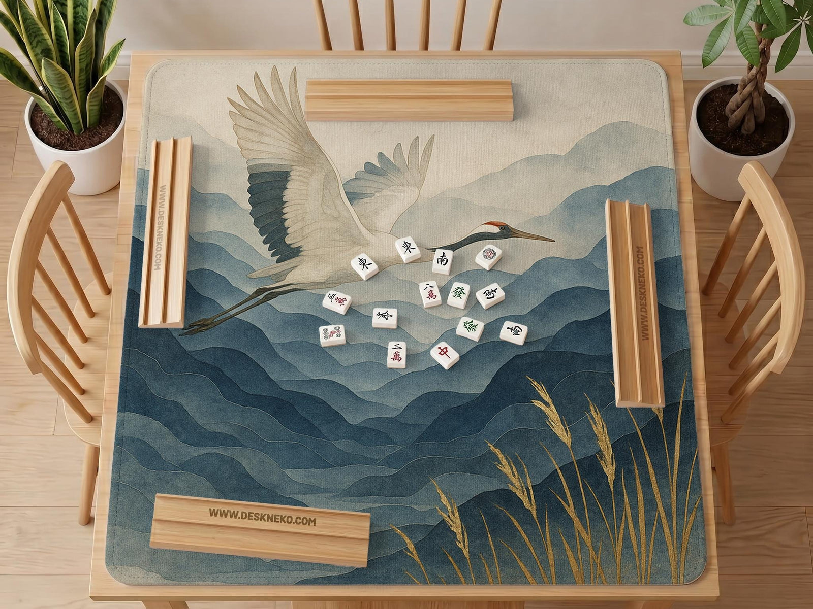 Square mahjong mat with an indigo and blue mountain landscape, two cranes, and cream-toned water or mist details.
