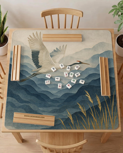 Square mahjong mat with an indigo and blue mountain landscape, two cranes, and cream-toned water or mist details.
