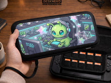 A Switch carrying case design with a cute green alien at a gaming desk, glowing cyan lights, and pastel stars on a dark background.