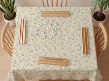 Sage green mahjong mat with vine and botanical artwork in cream neutral tones, shown in a cottagecore style with a tablecloth-style format.