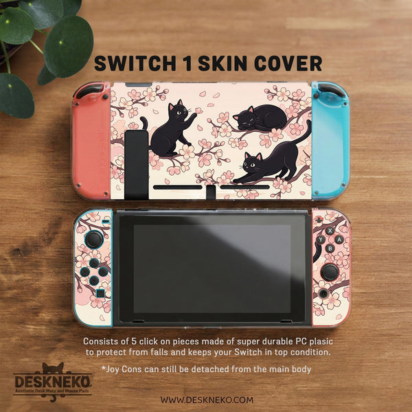 Switch case with black cats and cherry blossoms on a light pastel background.
