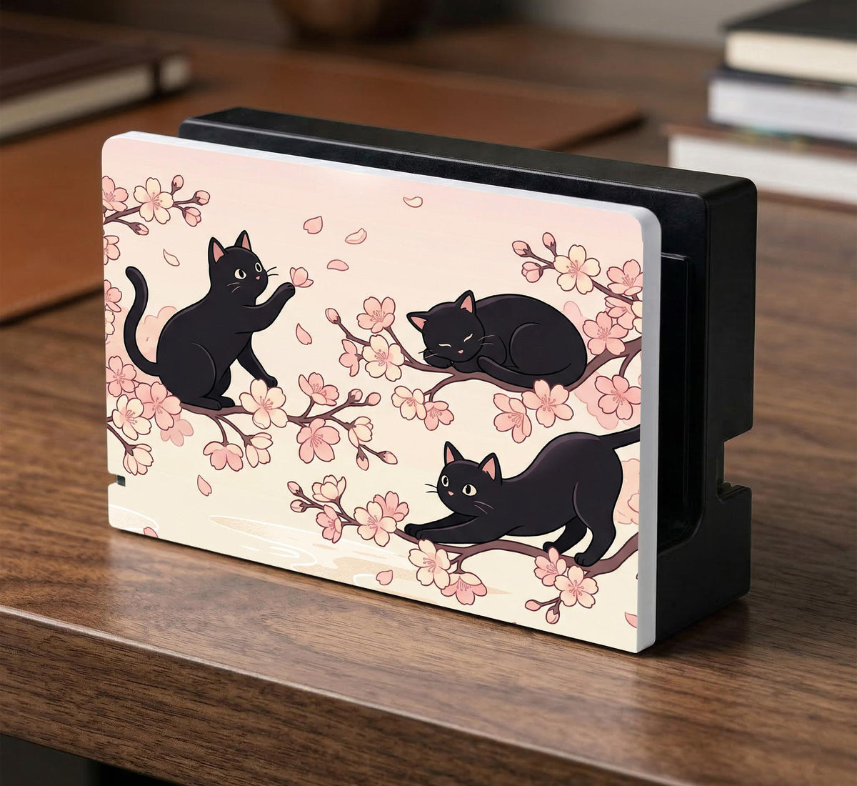 Switch case with black cats and cherry blossoms on a light pastel background.