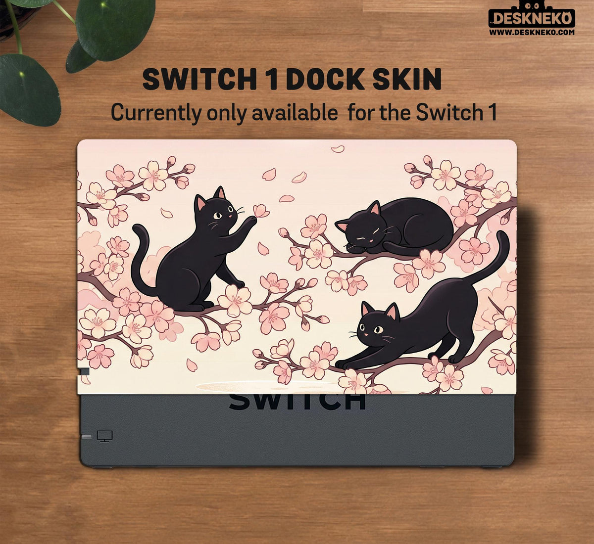 Switch case with black cats and cherry blossoms on a light pastel background.